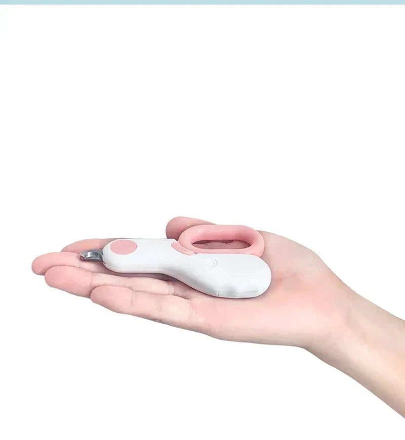 Load image into Gallery viewer, LED Pet Nail Clippers with LED light for safe trimming in hand.
