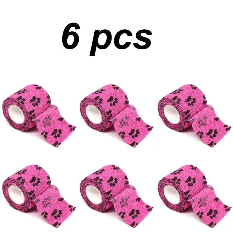 Load image into Gallery viewer, Eco-Friendly Pet Paw Wraps 6-Pack in pink with paw prints.
