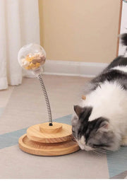 Interactive Cat Turntable Solid Wood toy with spring-loaded design, engaging cats.