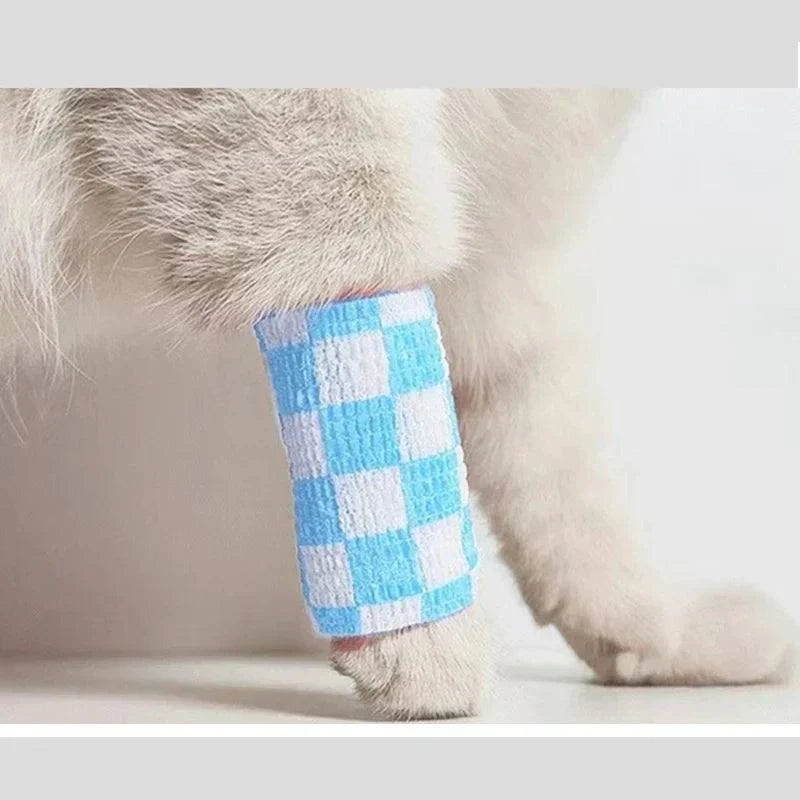 Load image into Gallery viewer, Eco-friendly pet paw wrap in blue and white, self-adhesive bandage, for protection and comfort.
