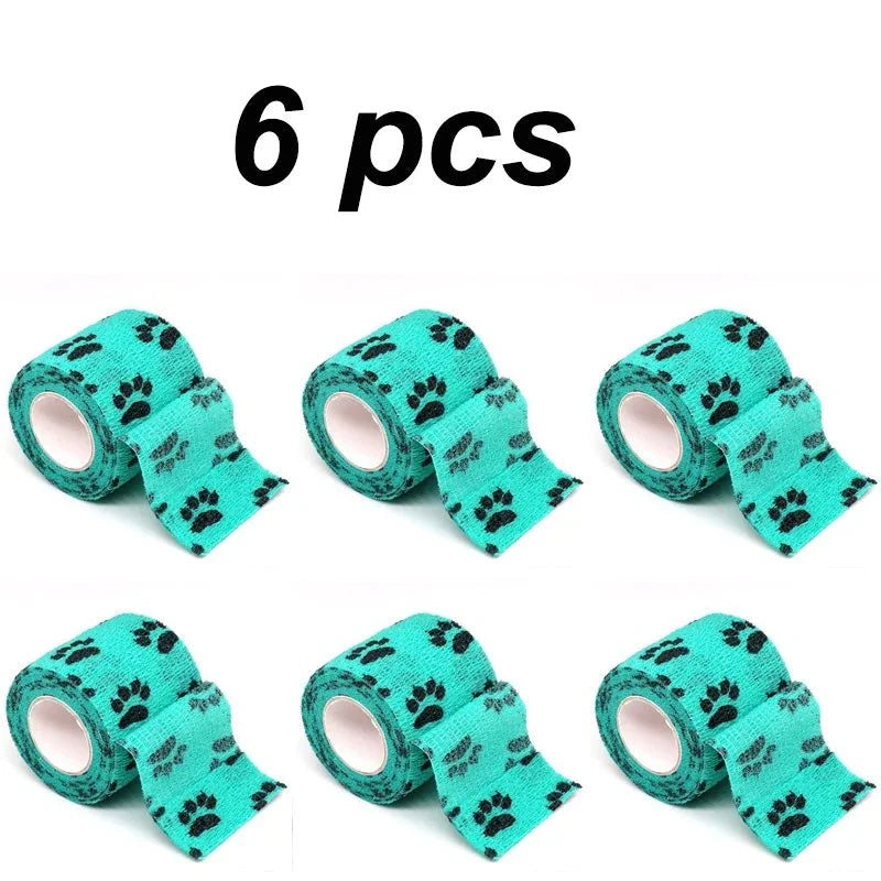 Load image into Gallery viewer, Eco-Friendly Pet Paw Wraps 6-Pack with paw print design.
