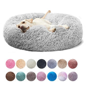 Round pet bed for large dog in plush material with bolstered edges, available in various colors.